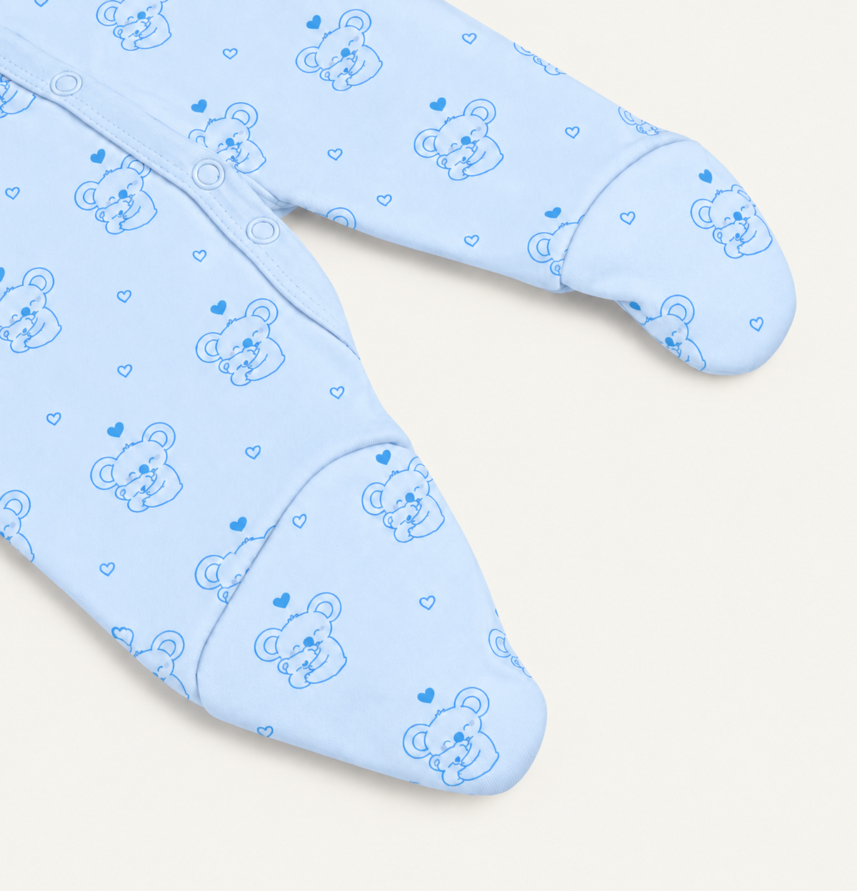 The Koala Footed Onesie, koala-and-heart print in blue